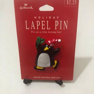 New Vintage Hallmark Holiday Lapel Pin Skating Penguin Santa Hat Brooch